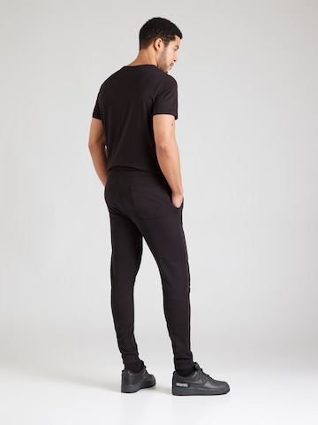 Tommy Jeans Tapered Broek in Zwart