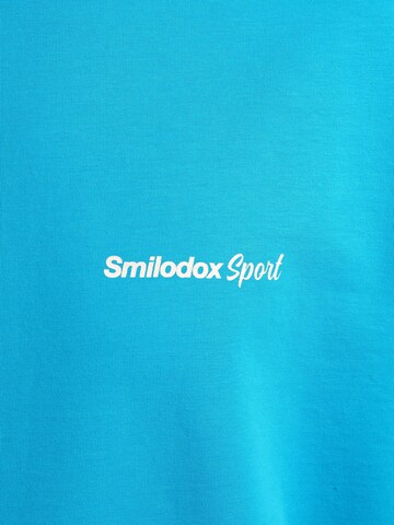 Smilodox T-Shirt Oversize Backprint Tamio in Blau
