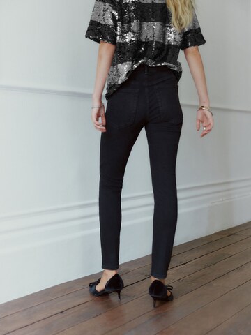 Skinny Jeans de la Next pe negru