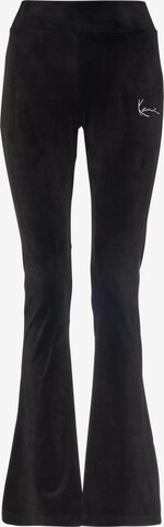 Karl Kani Flared Pants in Black: front