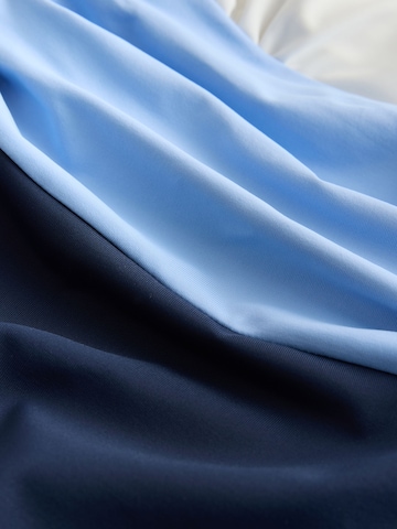 Costum de baie modelator de la Next pe albastru