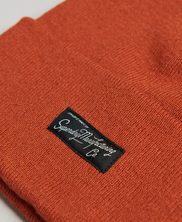 Bonnet Superdry en orange