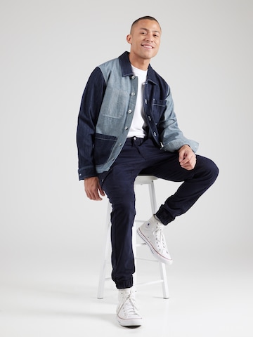 GUESS Tapered Hose 'NEW KOMBAT' in Blau