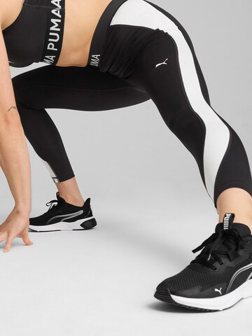 PUMA Skinny Sportbyxa 'Strong' i svart
