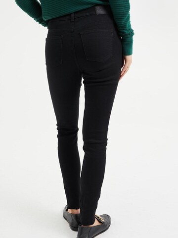 Skinny Jeans di WE Fashion in nero