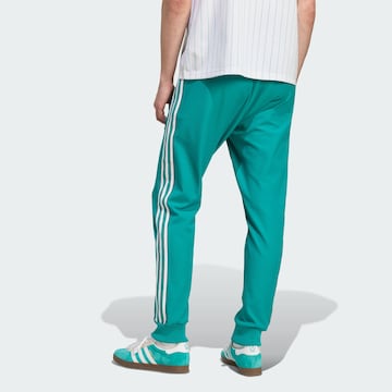 Effilé Pantalon de sport 'Liverpool FC Terrace Icons' ADIDAS ORIGINALS en vert