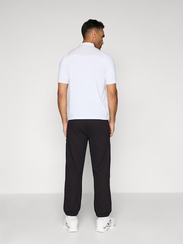 BOSS Конический (Tapered) Спортивные штаны 'League Hurley' в Черный