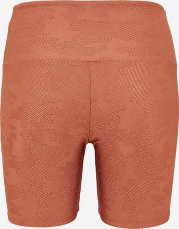 Skinny Pantaloni sportivi di Onzie in beige