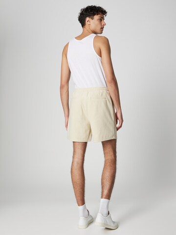 ABOUT YOU x Jaime Lorente Regular Trousers 'Leon' in Beige