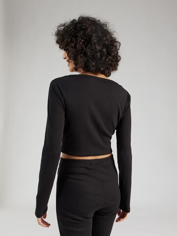Calvin Klein Jeans Na zvonec Hlače | črna barva