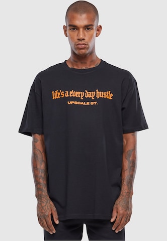 MT Upscale Тениска 'Hustle' в черно: отпред
