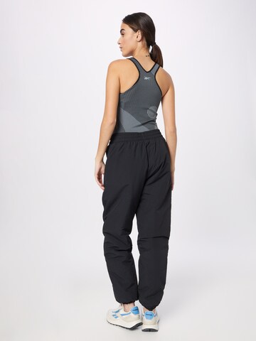 Reebok Tapered Sportbroek in Zwart