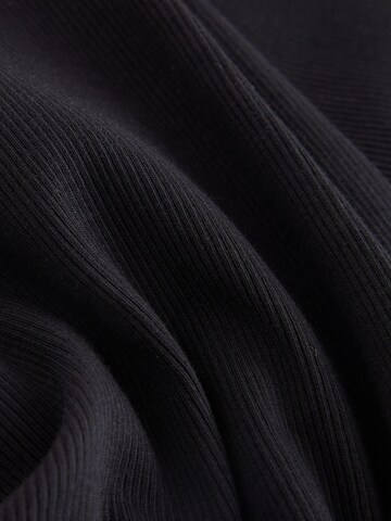 Next - Acampanado Leggings en negro