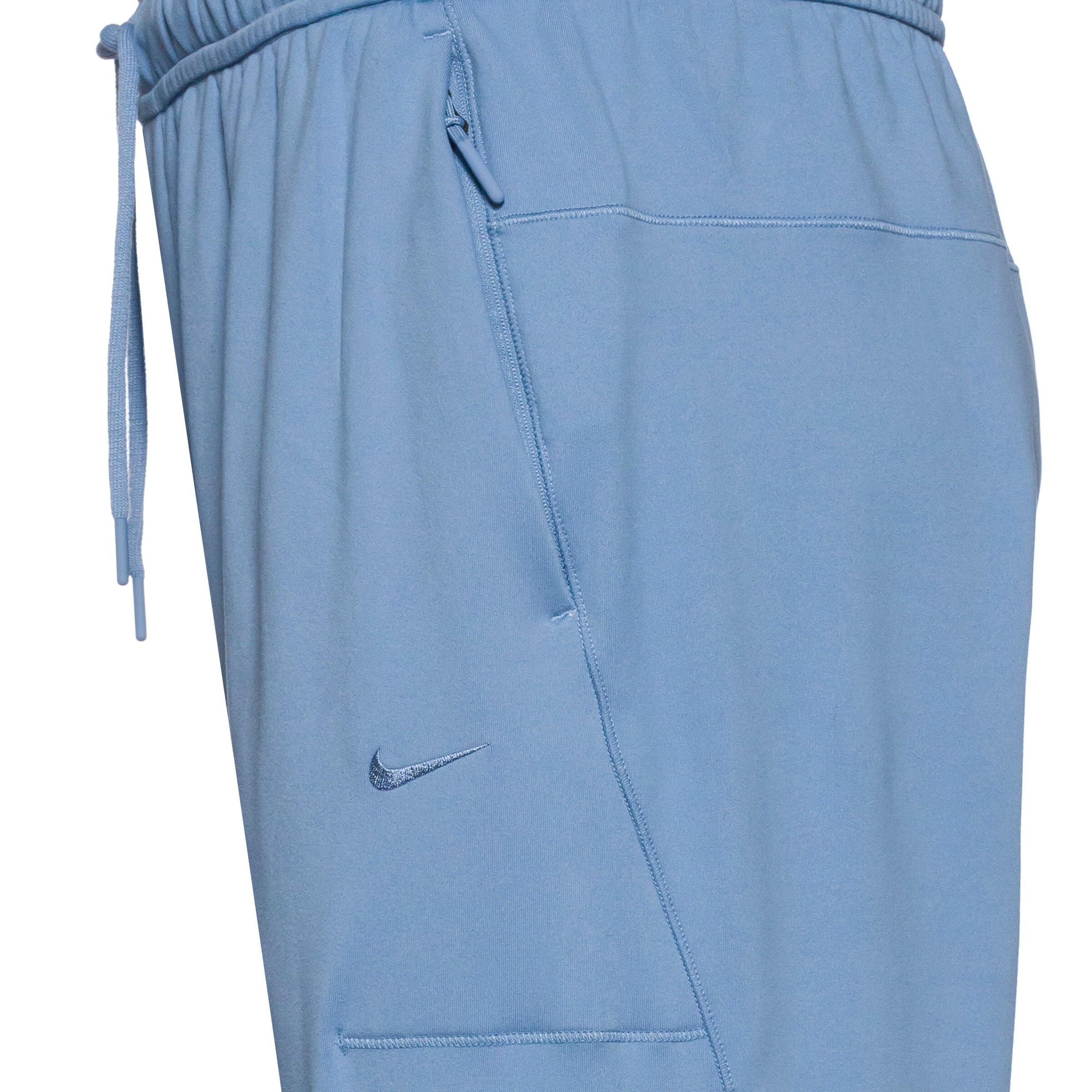 NIKE Tapered Workout Pants in Blue