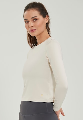 Athlecia Functioneel shirt in Beige