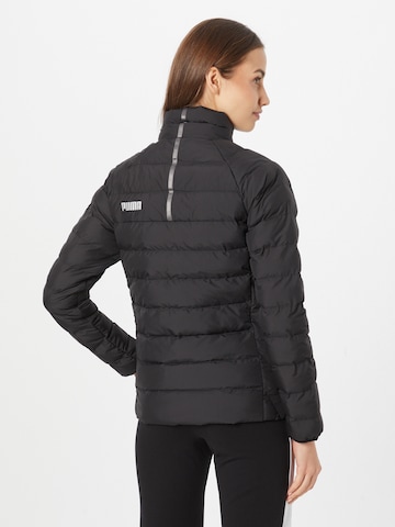 PUMA Sportjacke in Schwarz