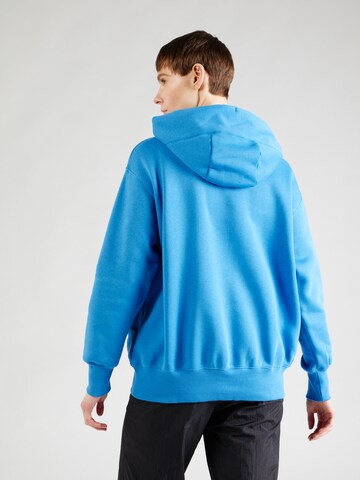 Nike Sportswear Bluzka sportowa 'Phoenix Fleece' w kolorze niebieski