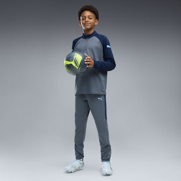 PUMA Slimfit Sportbroek in Blauw