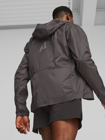 PUMA Sportjacke in Schwarz