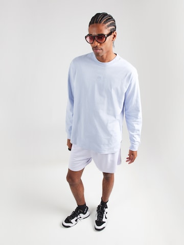 Nike Sportswear T-shirt 'Premium Essentials' i grå