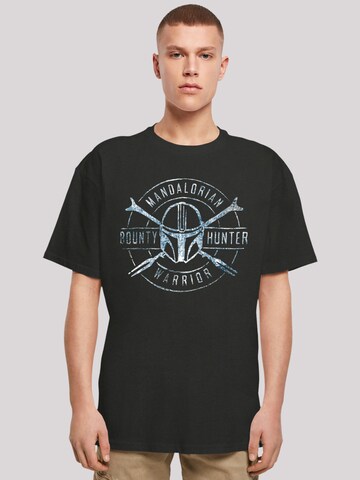 F4NT4STIC Shirt 'Star Wars The Mandalorian Bounty Hunter' in Schwarz: predná strana