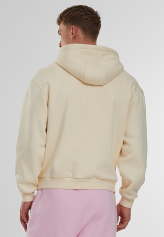 Urban ClassicsSweater majica 'Fluffy' - bež boja