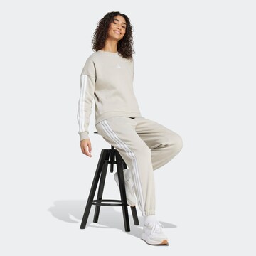 ADIDAS SPORTSWEAR Tapered Workout Pants in Beige