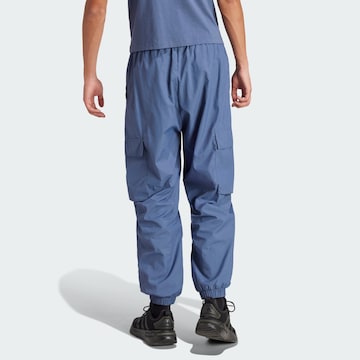 ADIDAS SPORTSWEAR Loose fit Workout Pants ' City Escape ' in Blue