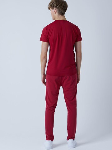Coupe slim Pantalon de sport 'Slim Training Pants' SPORTKIND en rouge