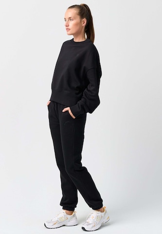 OCEANSAPART - Sudadera 'Jenny' en negro