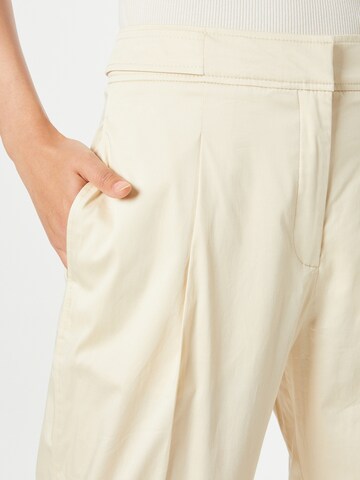 s.Oliver BLACK LABEL Tapered Pleat-front trousers in Yellow