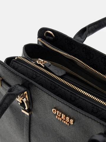 GUESSRučna torbica 'Leona' - siva boja