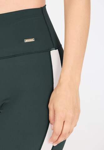 Athlecia Skinny Sports trousers 'Aspasia' in Green