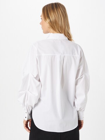 River Island - Blusa en blanco