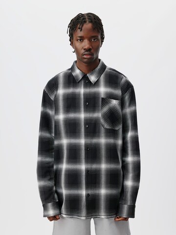 ABOUT YOU x Kingsley Coman Regular fit Button Up Shirt 'Nils' in Black: front