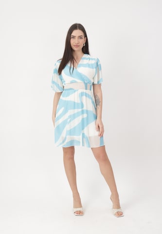 Elara Kjole i blå: forside