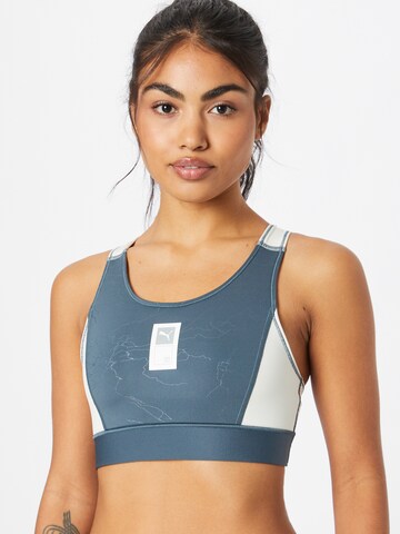 PUMA Bustier Sports-BH 'First Mile' i grøn: forside