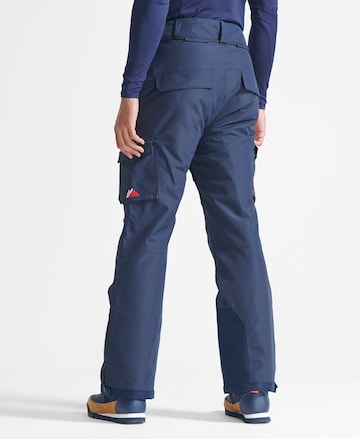 Superdry Snow Flared Sportbroek 'Ultimate Rescue' in Blauw