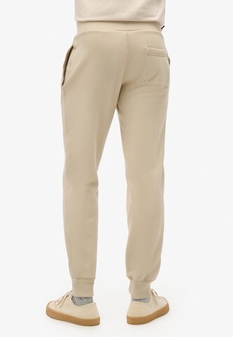 Superdry Regular Hose 'ESSENTIAL' in Beige