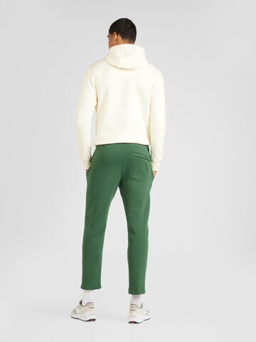 Nike Sportswear Normální Kalhoty 'CLUB FLEECE' – zelená