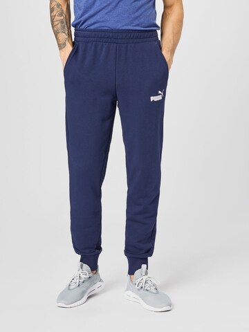 PUMA Tapered Workout Pants in Blue: front