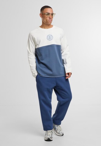 Felpa 'DMWU' di Unfair Athletics in blu