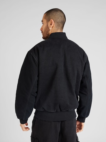 Carhartt WIP Overgangsjakke 'Paxon' i sort