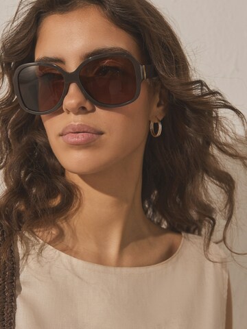 Lunettes de soleil Next en marron