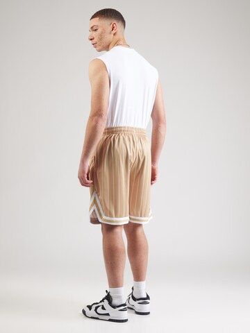 Karl Kani Loose fit Trousers in Beige