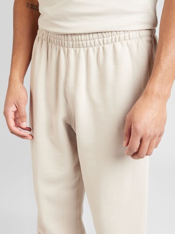ADIDAS ORIGINALS Tapered Trousers 'Adicolor Contempo' in Beige
