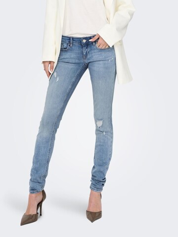 Skinny Jean 'Coral' ONLY en bleu : devant