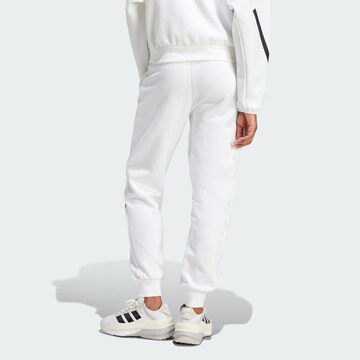 Tapered Pantaloni sportivi 'Z.N.E.' di ADIDAS SPORTSWEAR in bianco
