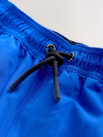 Next Plavecké šortky – modrá