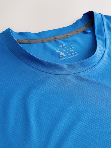 T-Shirt fonctionnel Next en bleu